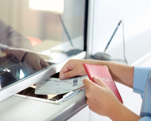 Airport Check-In Counters With Passengers