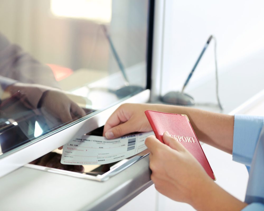 Airport Check-In Counters With Passengers